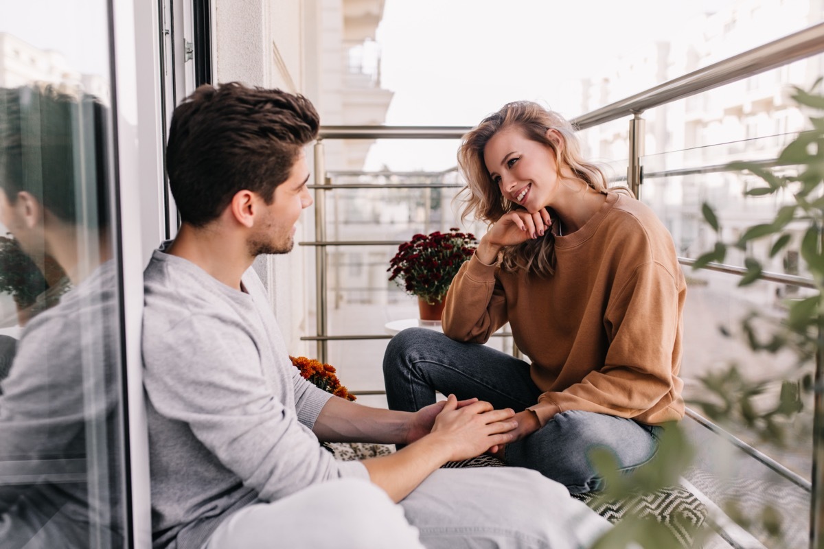 couple talking on the terrace