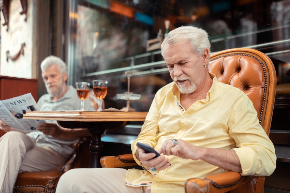 old man texting, stress signs