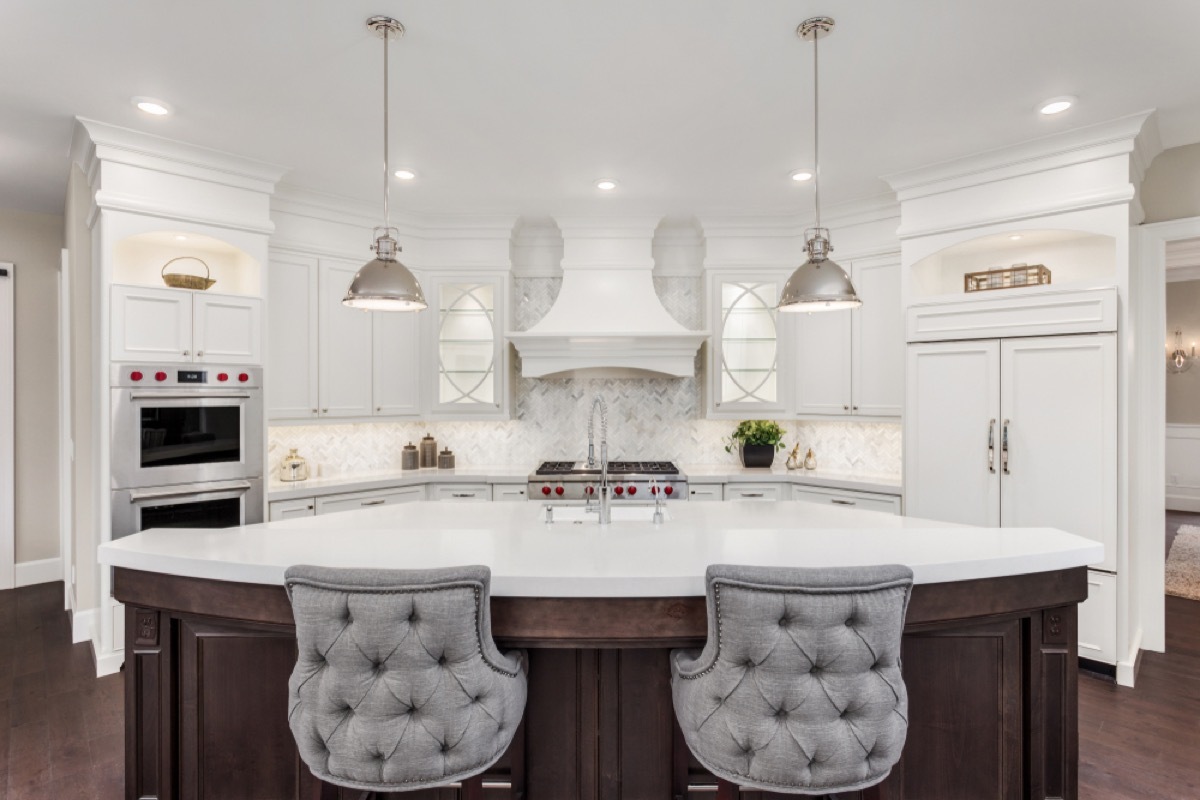 modern kitchen with white island