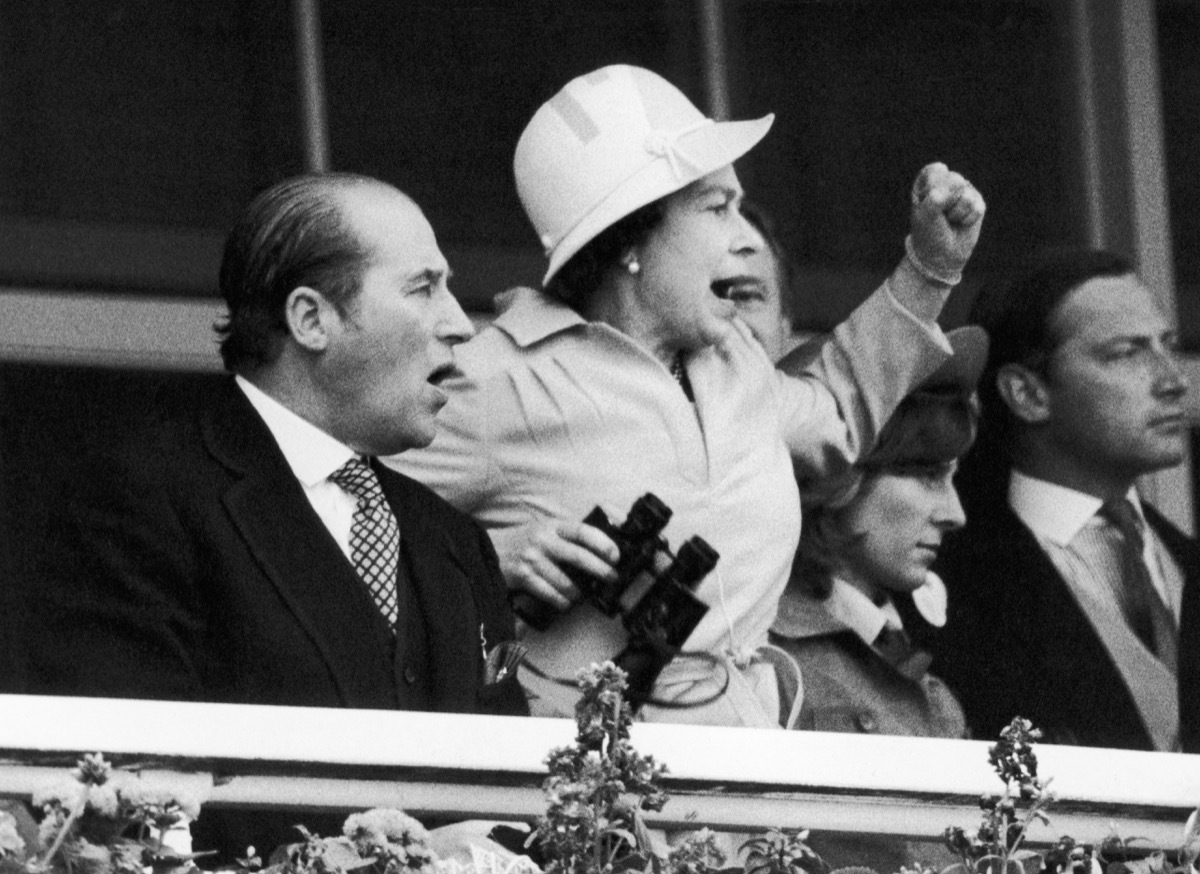 The Queen and her racing manager Lord Porchester watch the finish of the 1978 Epsom Derby . 8th June 1978