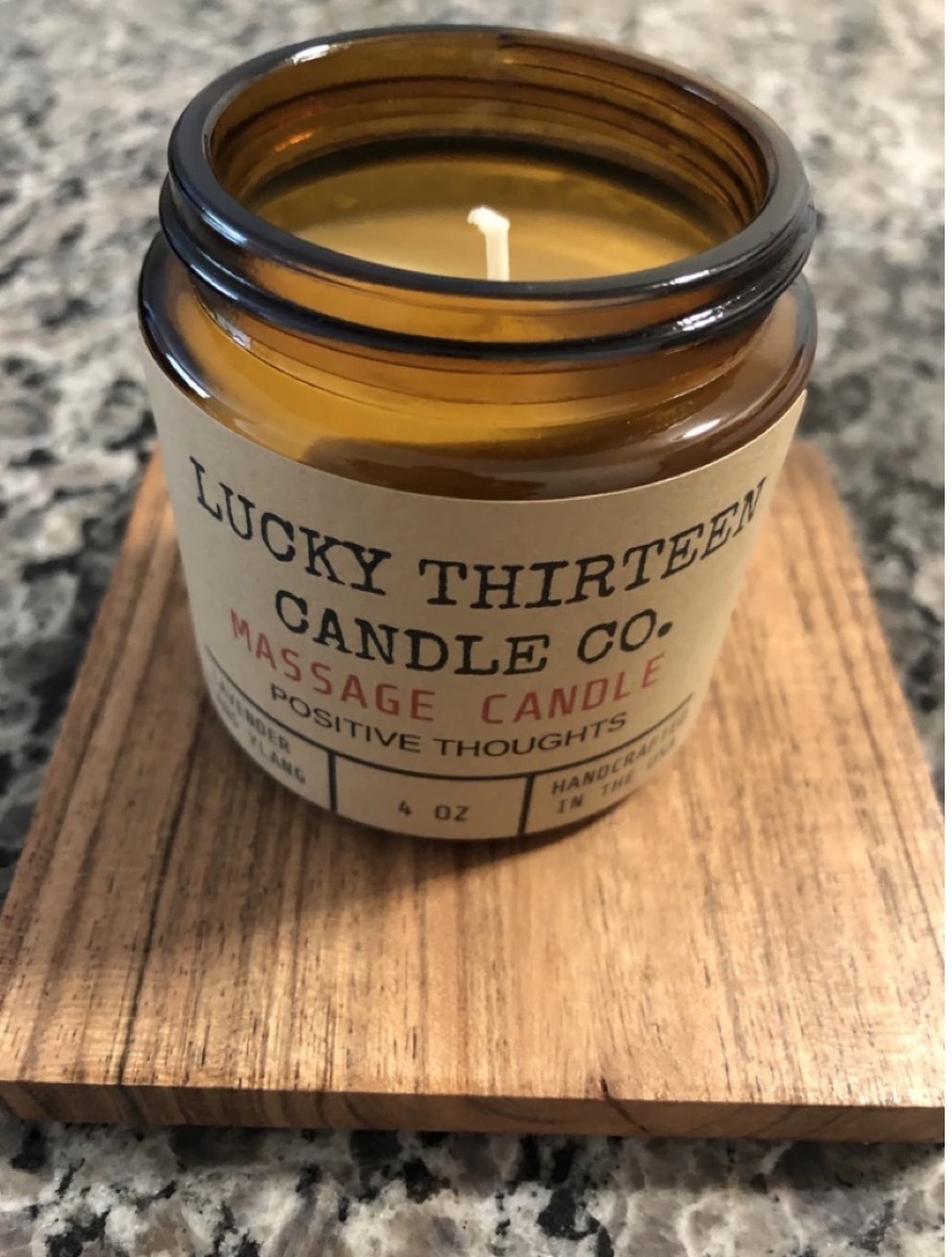 candle in brown glass jar