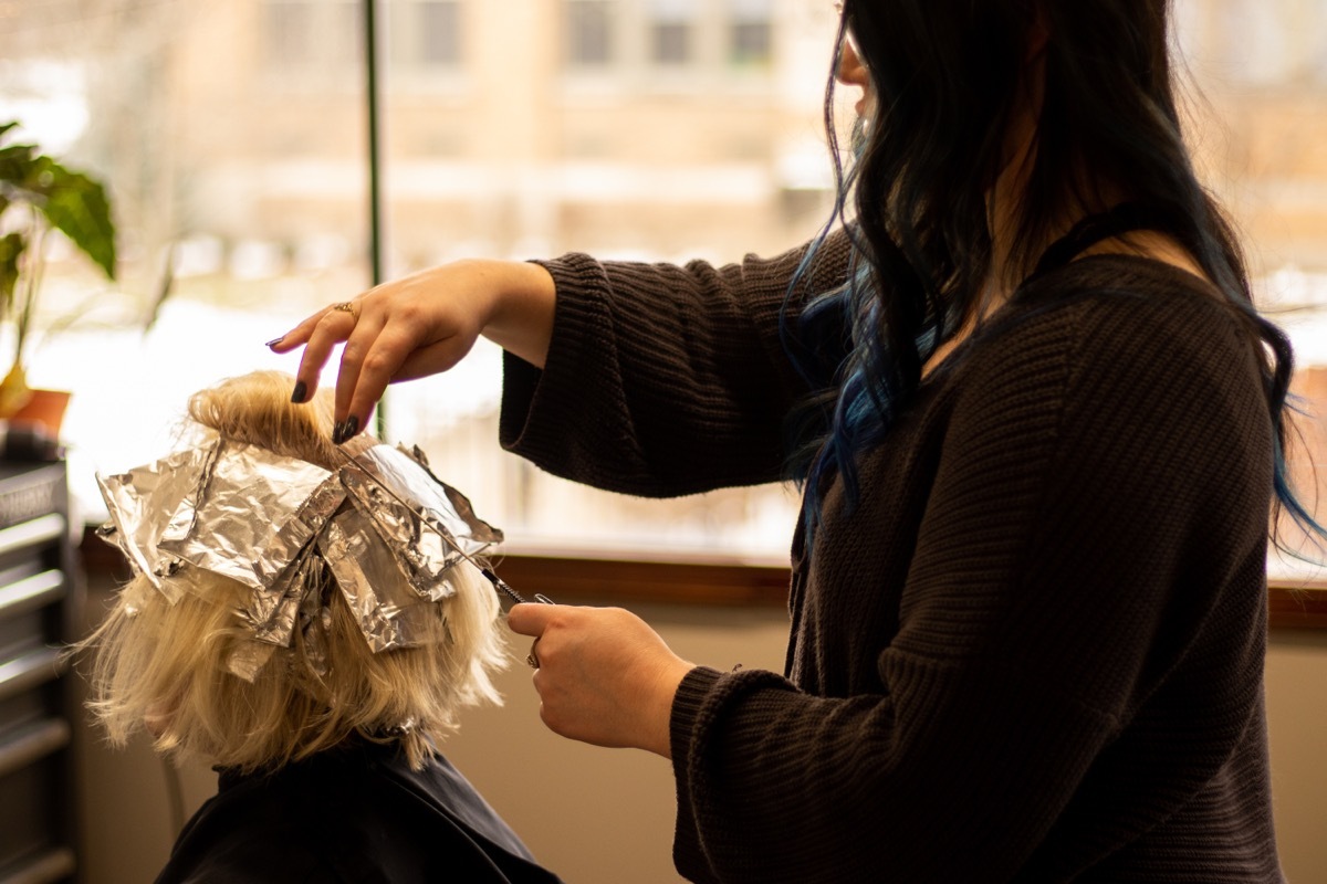 Woman Getting Highlights Done