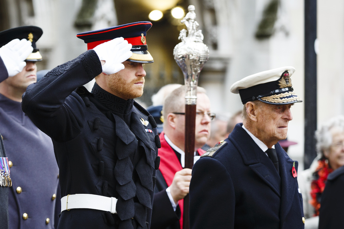 Prince Harry and Prince Philip, Duke of Edinbrugh attend the Fields of Remembrance at Westminster Abbey on November 10, 2016 in London, England.