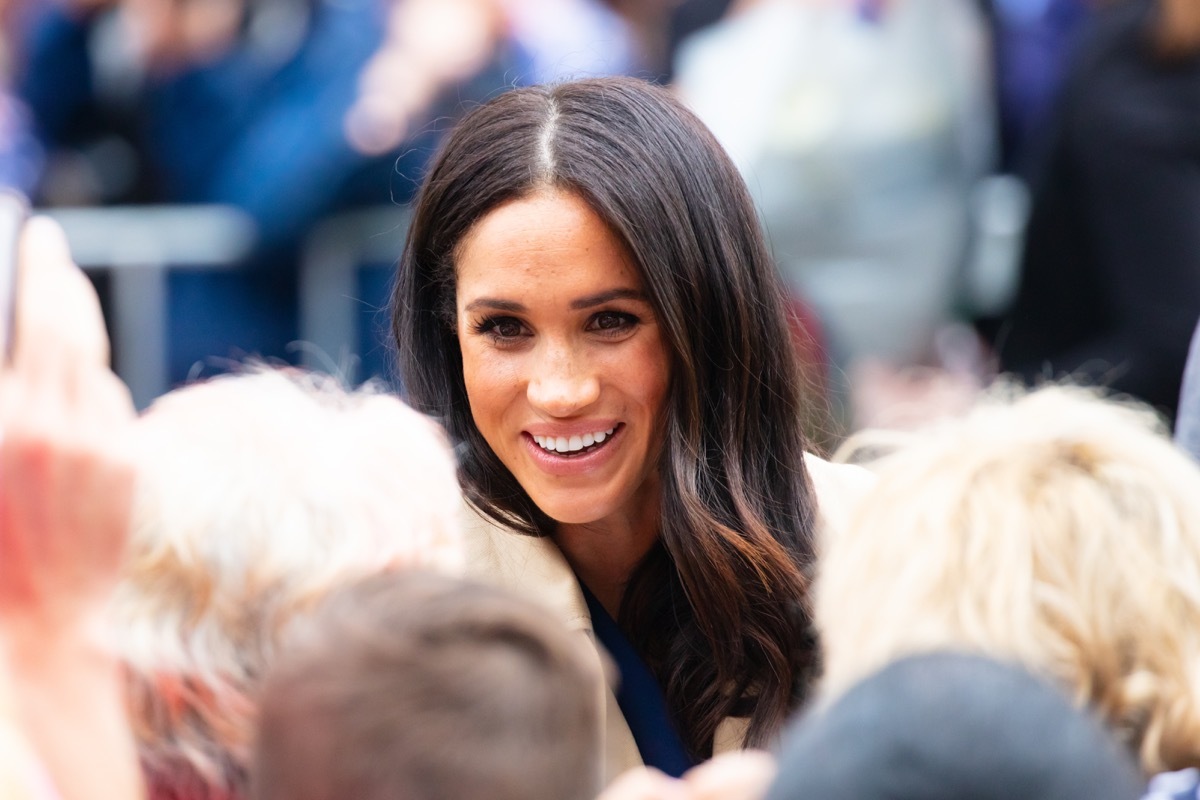 Baby Sussex Birth is imminent, photo of Meghan Markle smiling amidst crowd