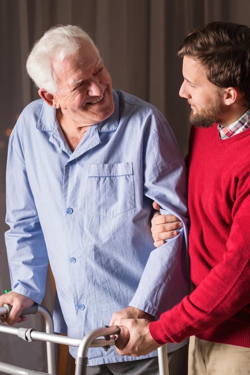 Man taking care of elderly father Christmas Perfectionism