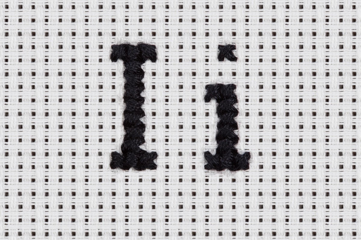 Alphabet, Letter and Icrons Cross-stitch hand crafted.