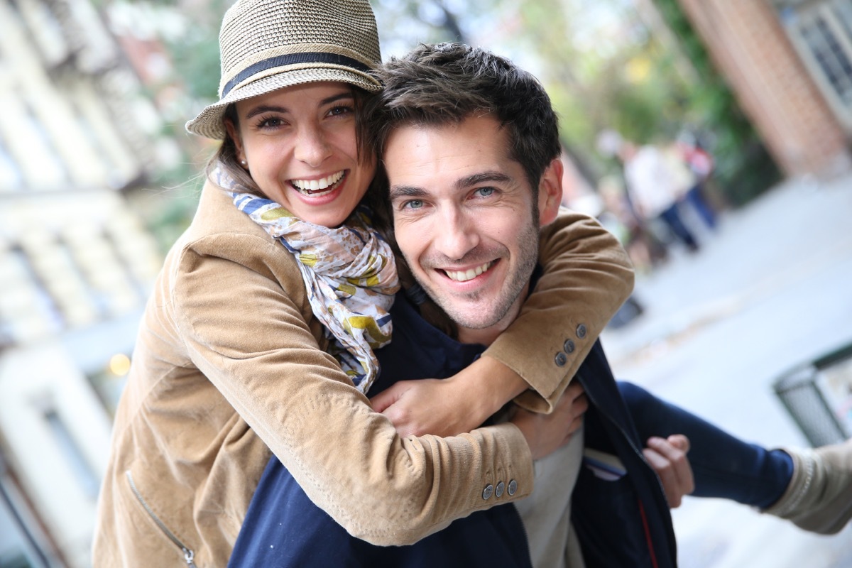 Girl on Boyfriend's Back