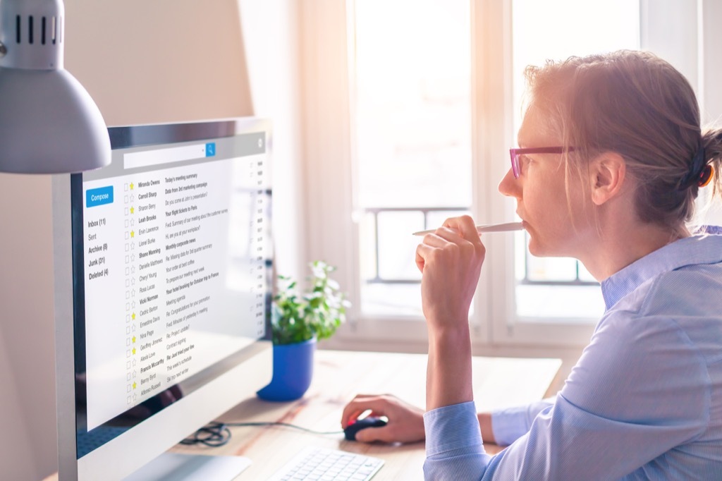 woman reading email