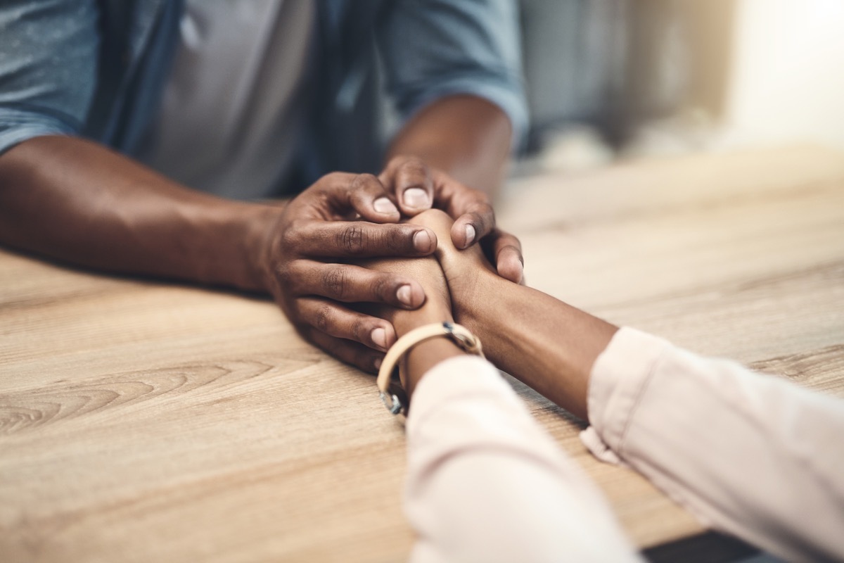 couple holding hands in gratitude to say thank you