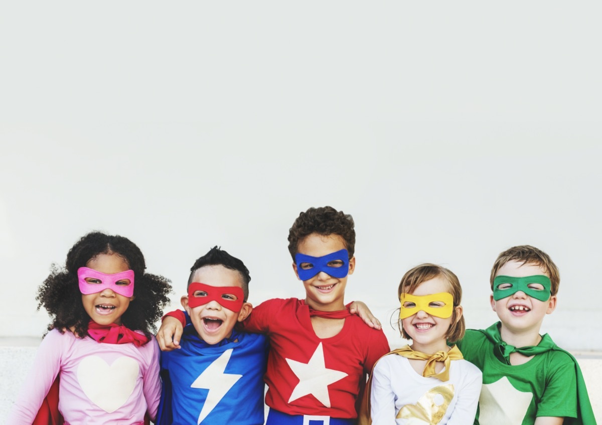 kids wearing superhero costumes