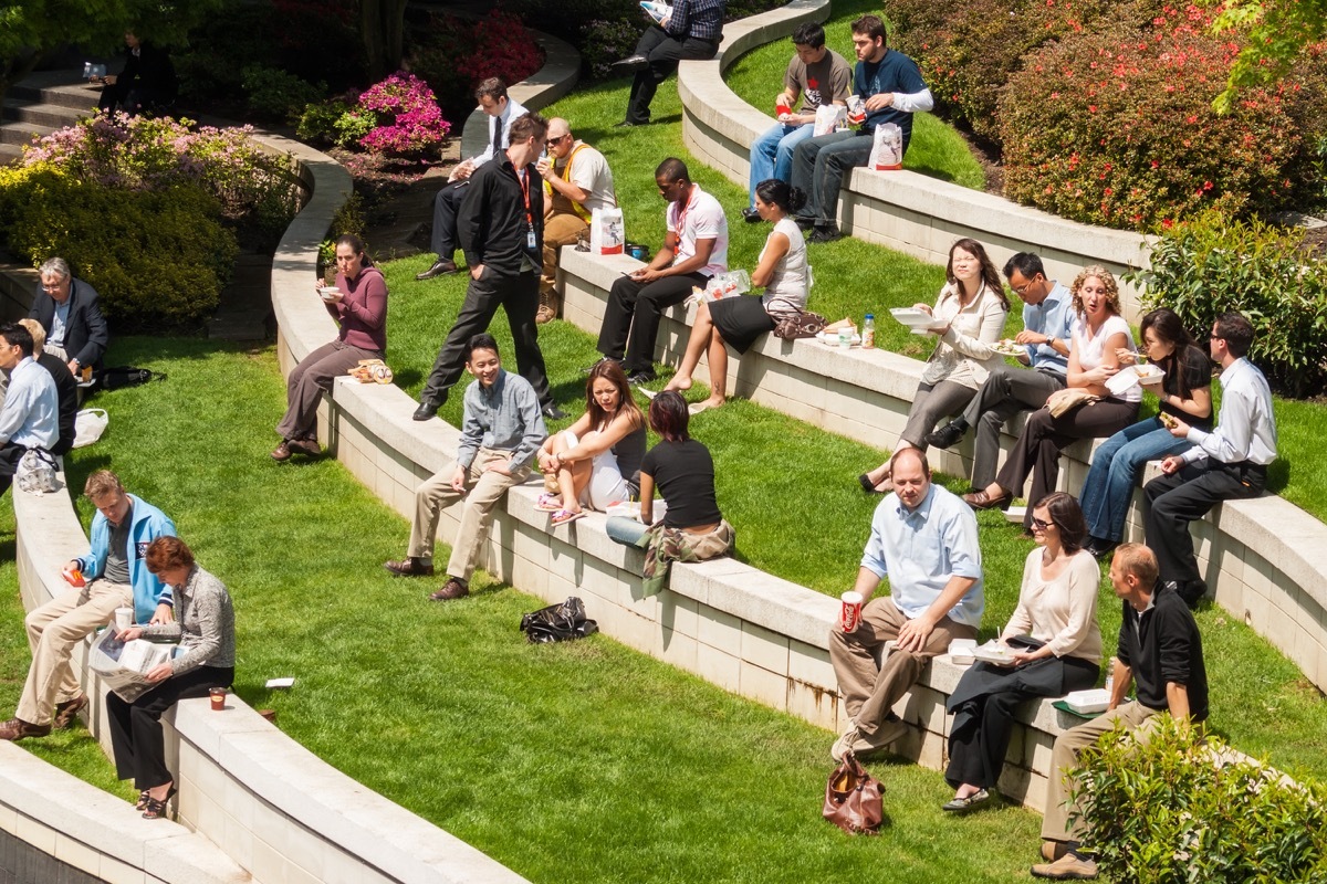 Groups of people sitting outside 