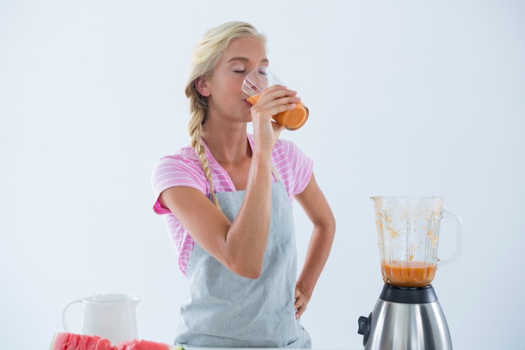 Woman Drinking Smoothie Dangerous Diet Fads