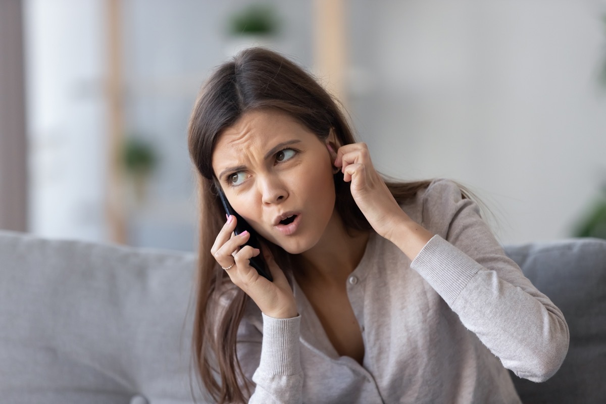 Woman having trouble hearing