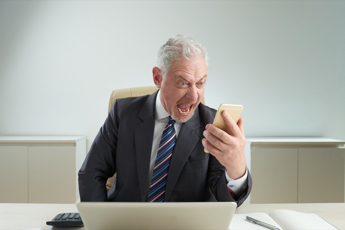 old man yelling at phone