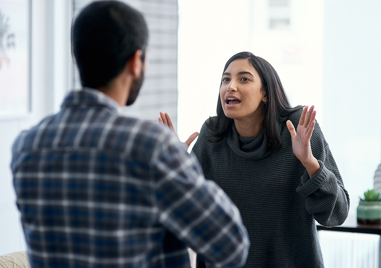 Shot of a young couple having an argument at home