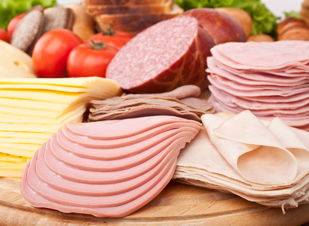 deli meats on wood plate