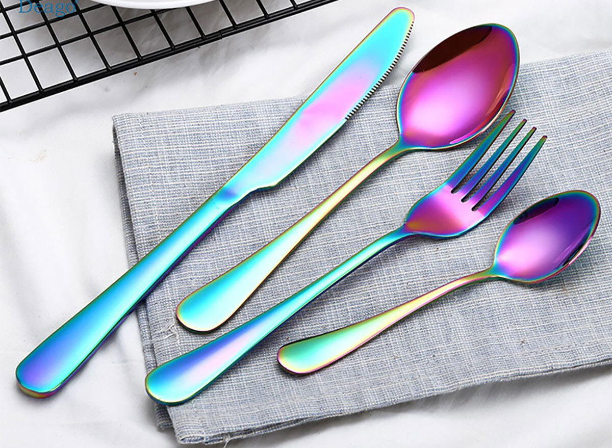 rainbow flatware on a cloth napkin