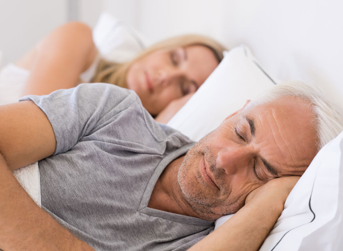 Older couple sleeping soundly together