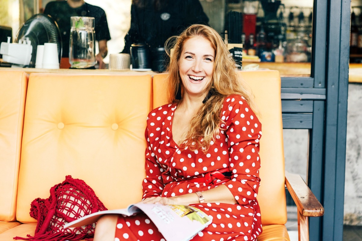 woman wearing red polka dot dress