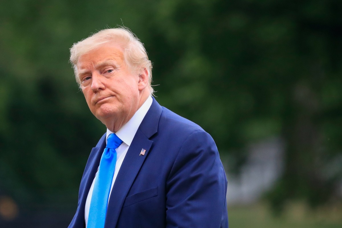 President Donald Trump walks across the South Lawn of the White House in Washington