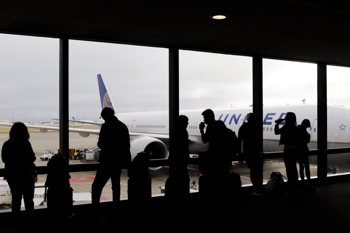 passengers getting ready to board united flight