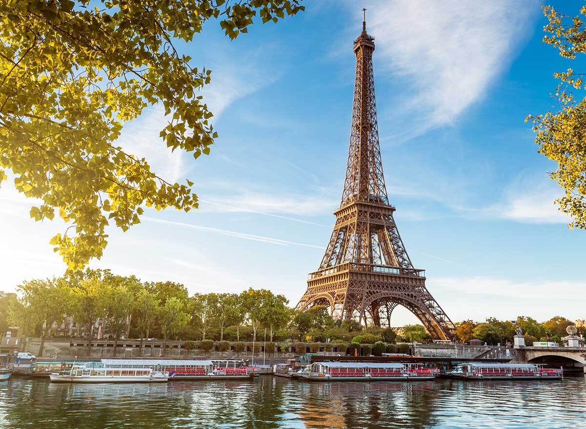 a view of the river and eiffel tower in paris