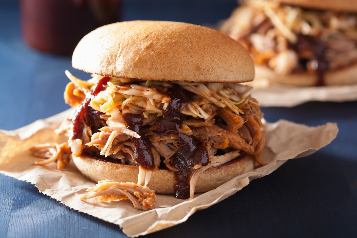 BBQ sauce on pulled pork sandwich