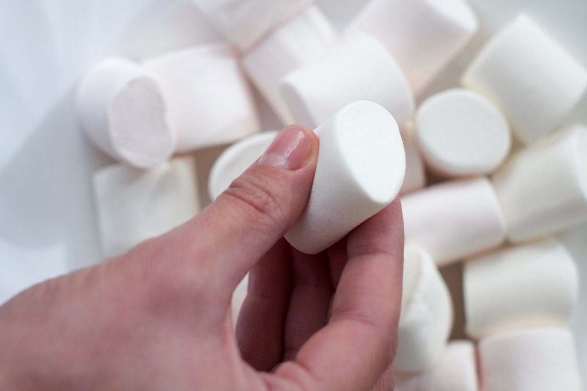 Woman holding a marshmallow