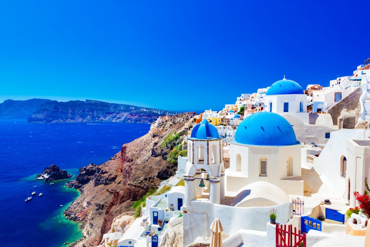 the famous blue-roof houses on santorini island greece