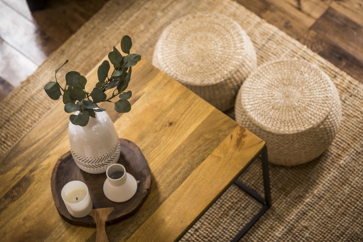 Close up on tray with decorative items in living room.