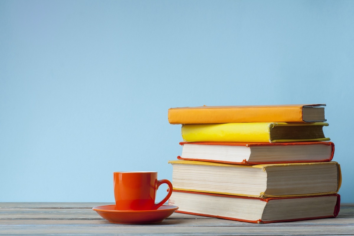 stack of books next to teacup