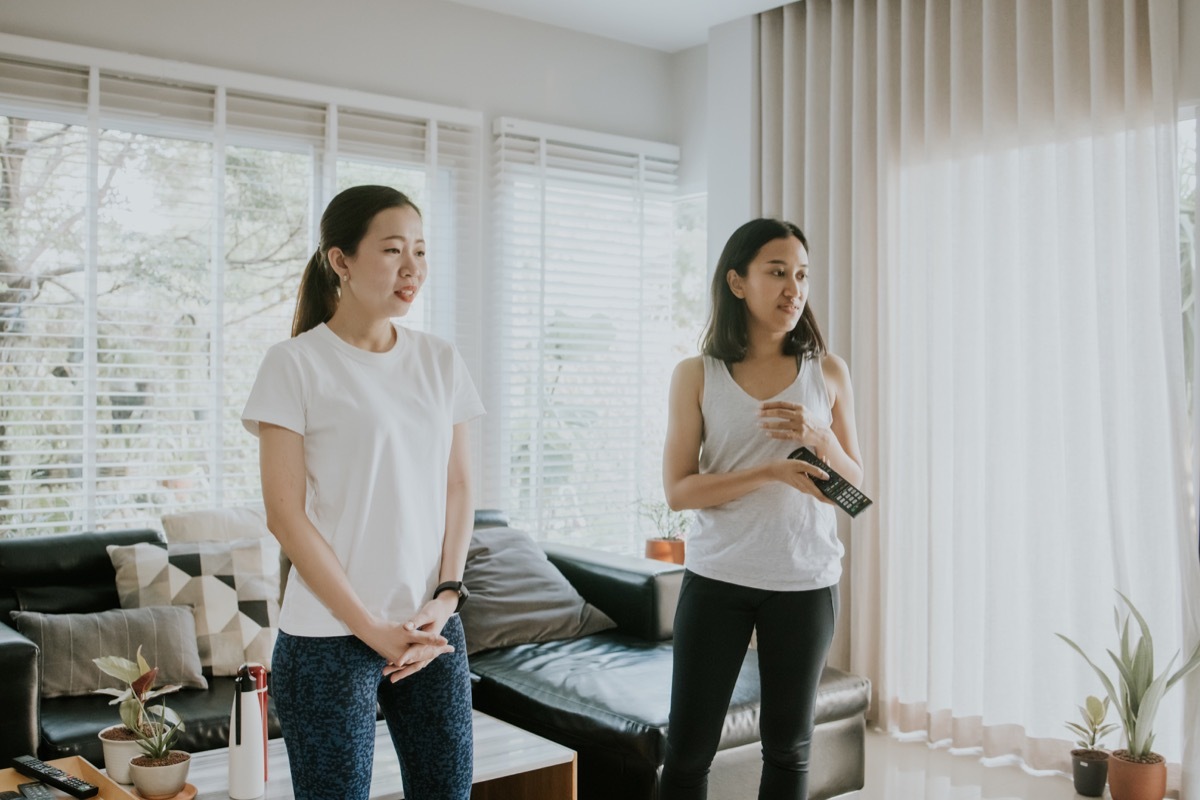 women are getting ready with an Aerobics classroom with an online learning class at home