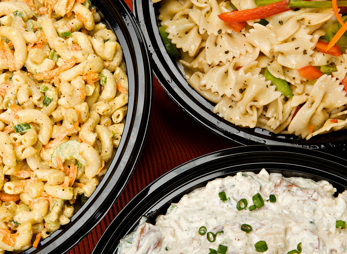 macaroni and potato salad served in black bowls