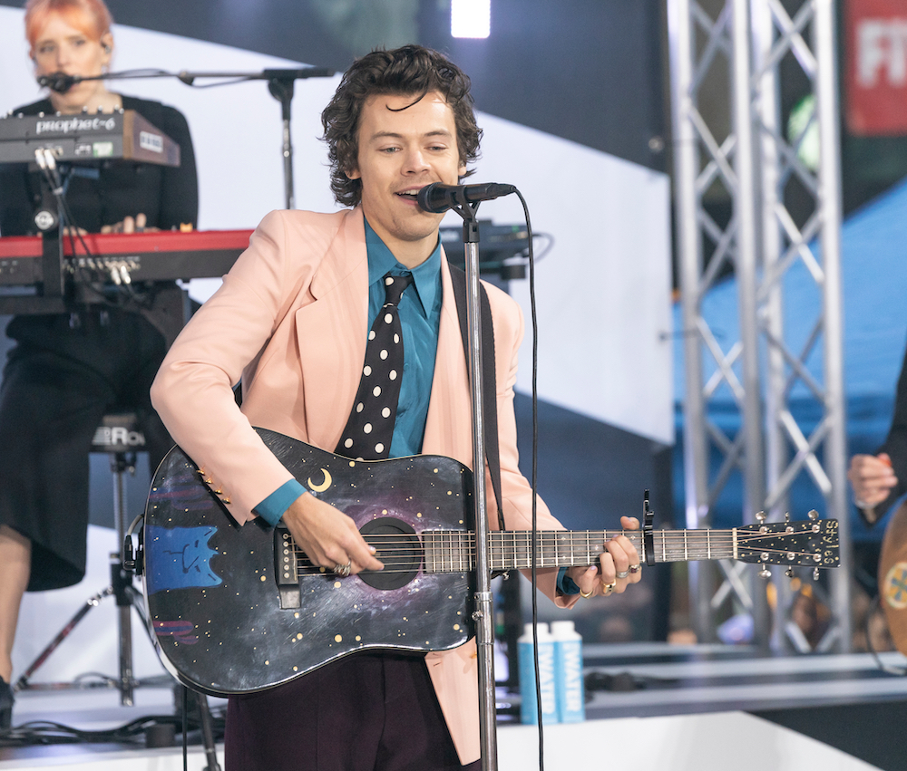 Harry Styles performing on 