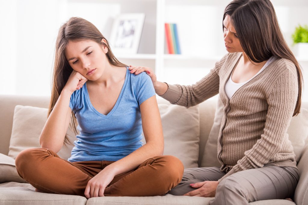 mother and daughter on couch