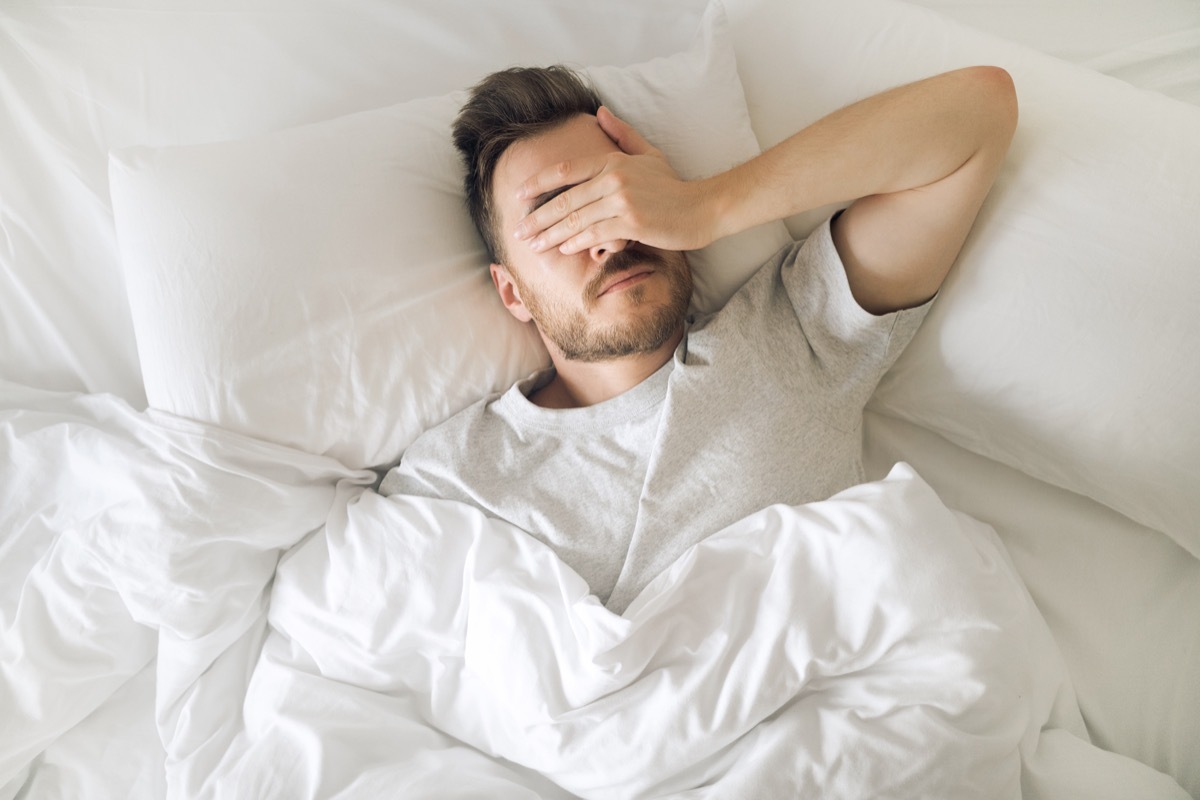 Lifestyle portrait of sleeping man