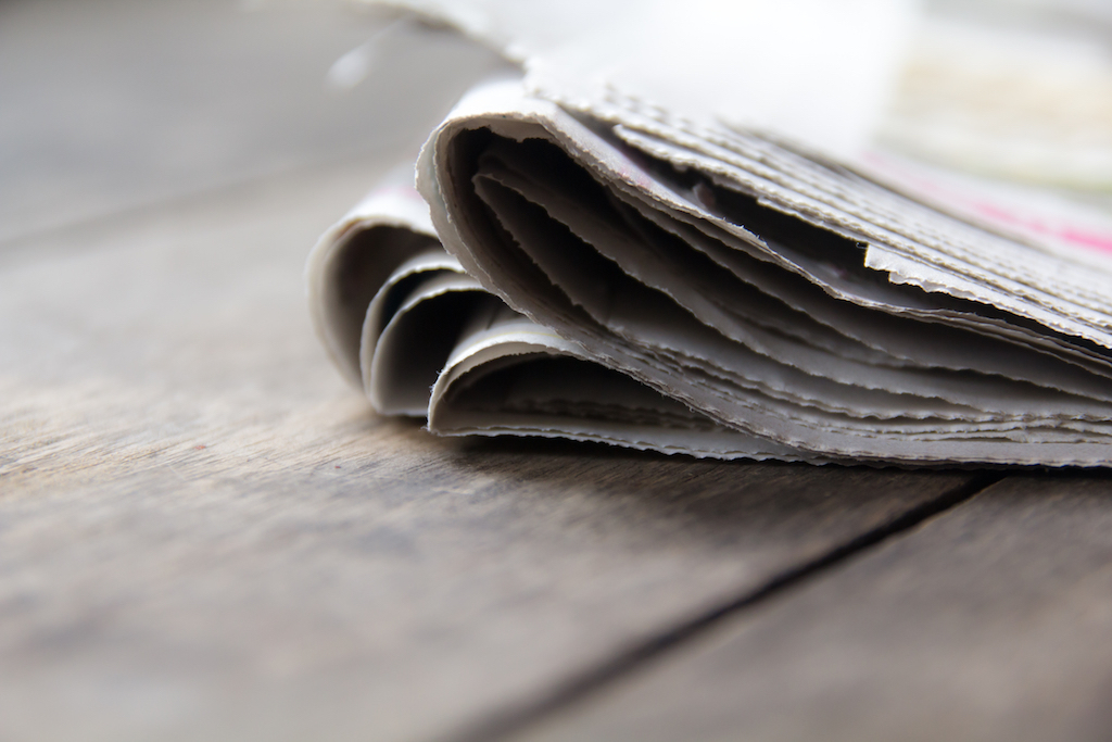 newspaper on the stairs