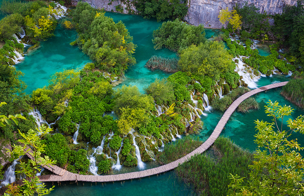 aerial view of a trail over lakes