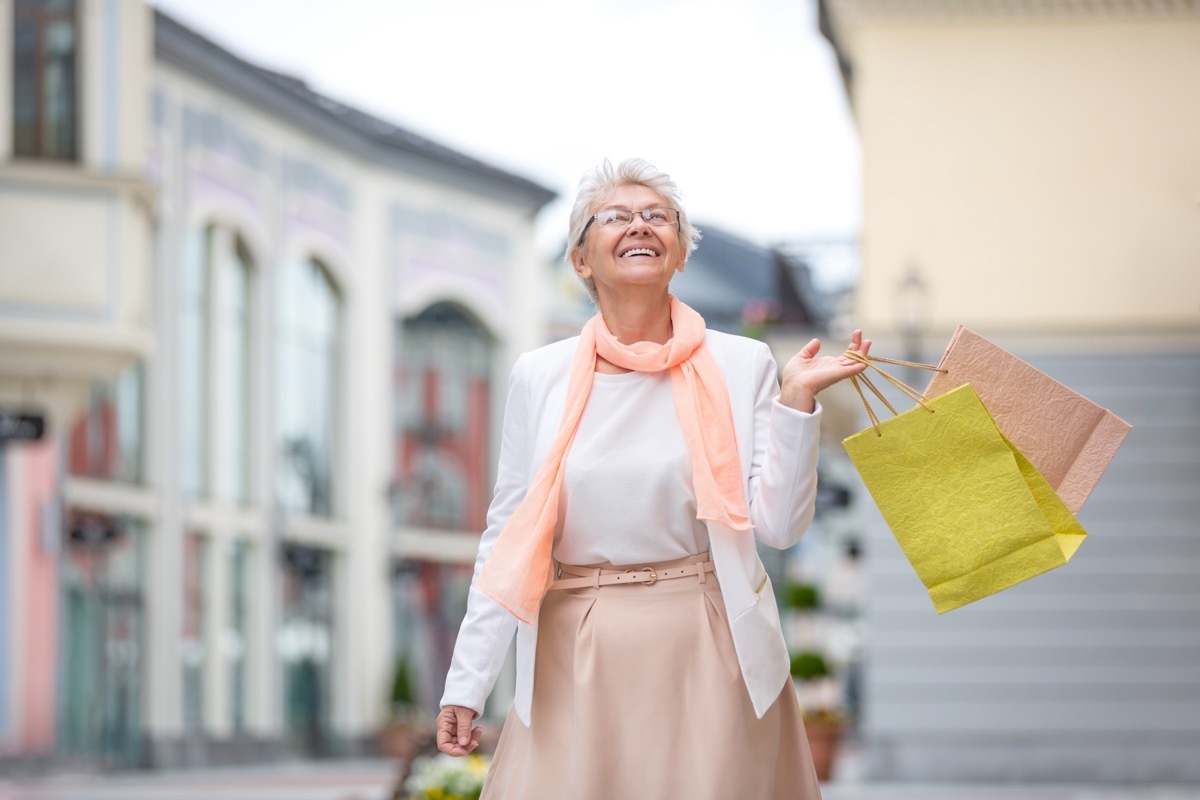 senior woman wearing pastel scarf