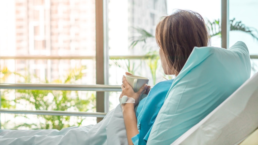 Woman in a hospital bed