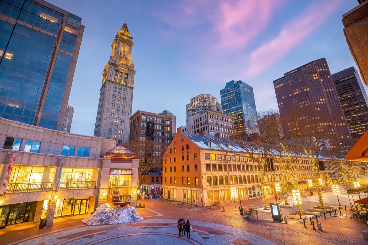 cityscape photos of buildings and shops in Quincy Market in Boston, Massachusetts at twilight