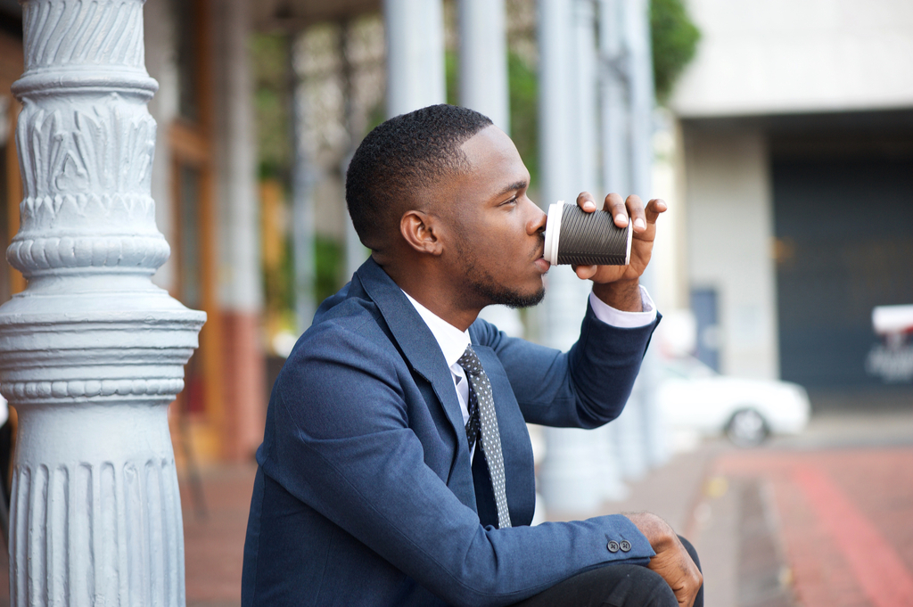 Man Drinking Coffee Fidgeting