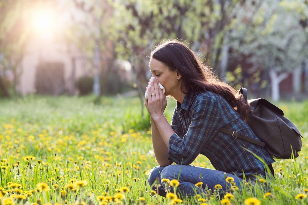 Young Woman Suffering From Allergies