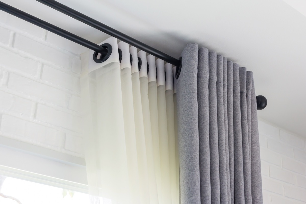 gray curtains over sheer panels